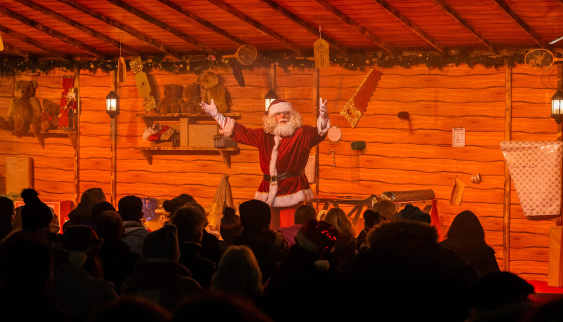 Santa appearing in a festive pantomime at Arley Station as part of the Santa Trains experience
