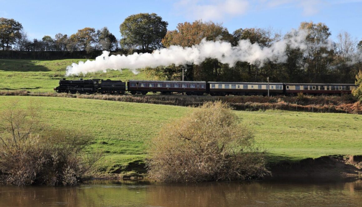 BR Standard 75069 passes the river Severn near Arley. KEITH WILKINSON