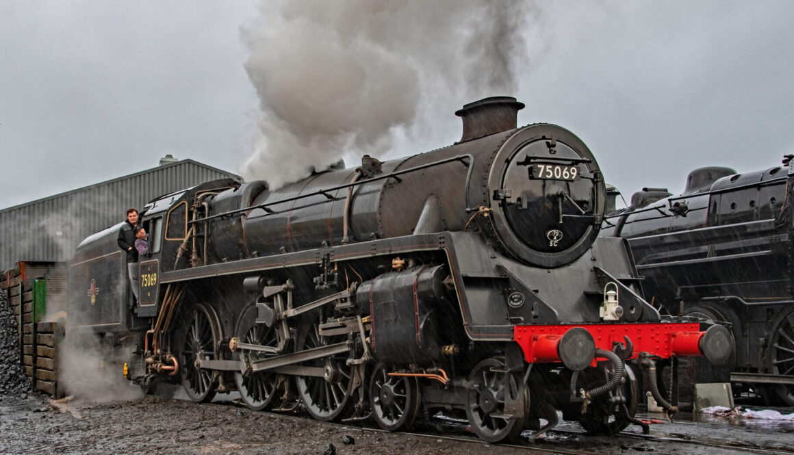 Driver Mick Matthews whistles up with fireman Alex Robinson standing, as 75069 is prepared for the SVR's Santa services in December. JOHN TITLOW