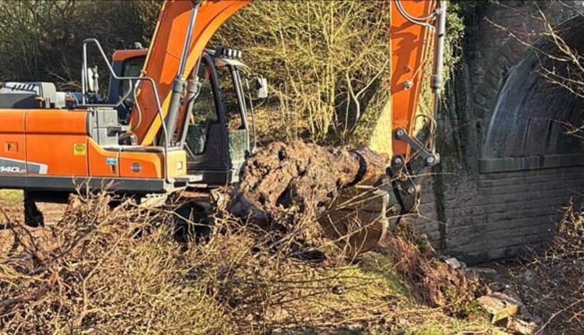 Excavator carefully removing debris at the SVR's Mor Brook landslip. CHRIS BOND