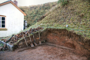 The original footprint of the hut is revealed. By STEVE DOWNS