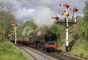 71000 Duke of Gloucester passes the signals at Bewdley South on the way to Kidderminster on 18 Apr 2026. John Sherratt
