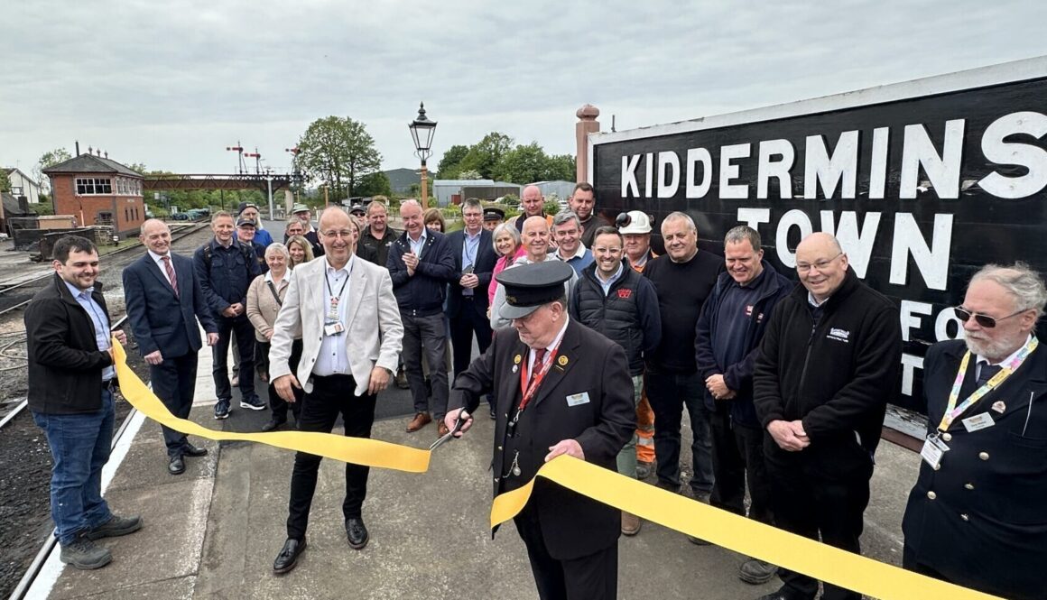 Kidderminster station master Rob Jones cuts the ribbon for the new platform extension. Keith Wilkinson